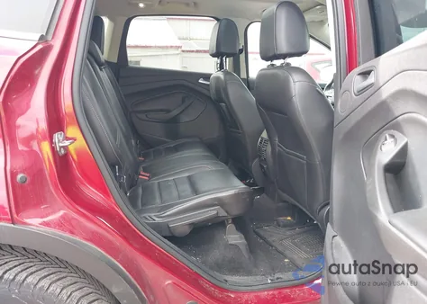 2017 Ford Escape Titanium z USA, uszkodzony, nr VIN 1FMCU9J97HUD48204